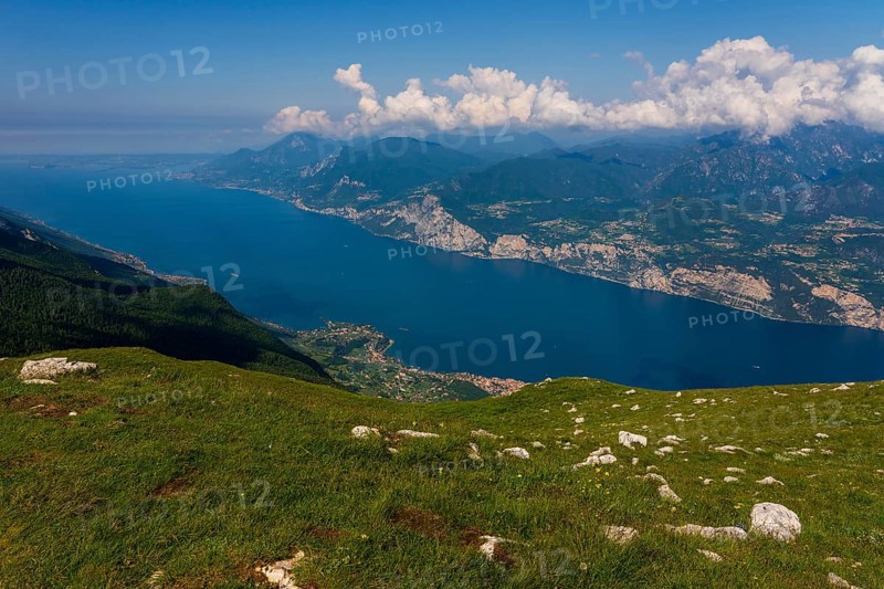 Panoramic view from Monte Baldo on the old town of Malcesine and Lake Garda in Italy