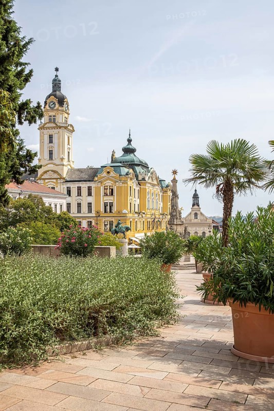 Historic city centre and central square with old historic buildings. Széchenyi Square in the centre of the five-church town shows the historical heritage of the city of Pécs, Dél-Dunántúl, Hungary, Europe