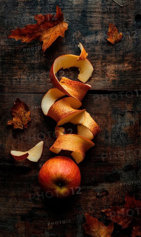 Apple peels on wooden table AI generated