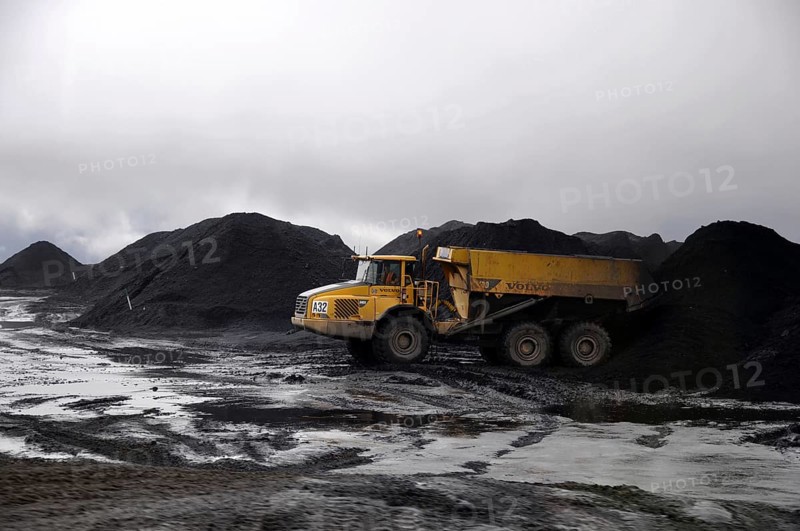 Westport, New Zealand, circa 2009: Coal truck dumps 70 ton load in stockpile at Stockton Coal Mine, Westland, New Zealand, Oceania