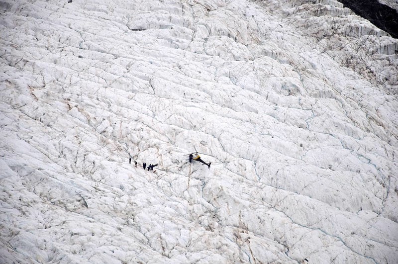 Group of tourists on the Franz Josef Glacier, Westland, New Zealand, Oceania