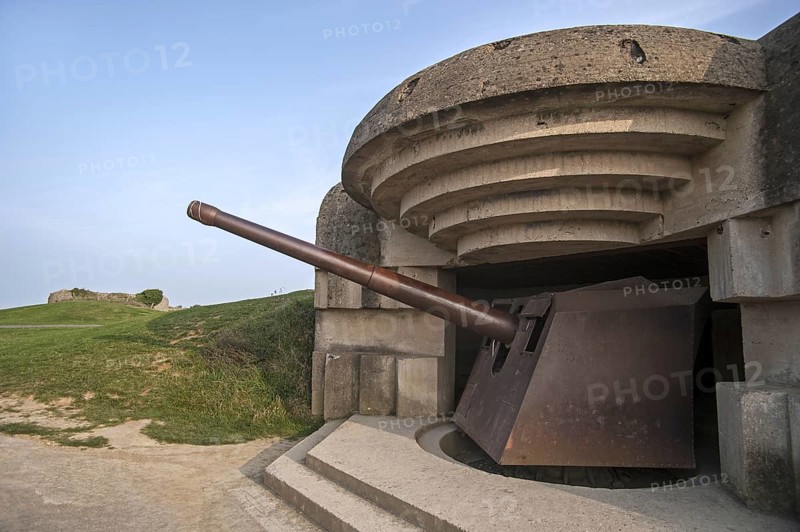 German 152 mm navy gun in bunker of the Batterie Le Chaos, part of the Atlantikwall at Longues-sur-Mer, Normandy, France, Europe