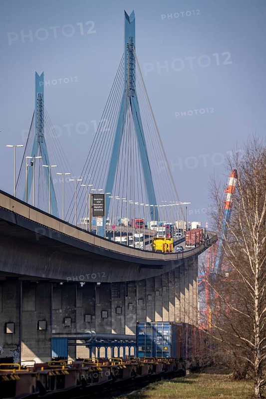 The Köhlbrand Bridge in the port of Hamburg, at the back of the goods train line, spans the 325 m wide Köhlbrand, an arm of the Süderelbe, the bridge is over 3600 metres long, 53 metres above the water, piers 135 m high, more than 30, 000 vehicles use the B3 bridge daily, important connection to the port, it is dilapidated, to be rebuilt, Hamburg, Germany, Europe