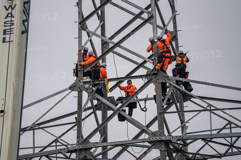 Installation of a high-voltage pylon, construction of a new line route, near Neuss-Holzheim, North Rhine-Westphalia, Germany, Europe