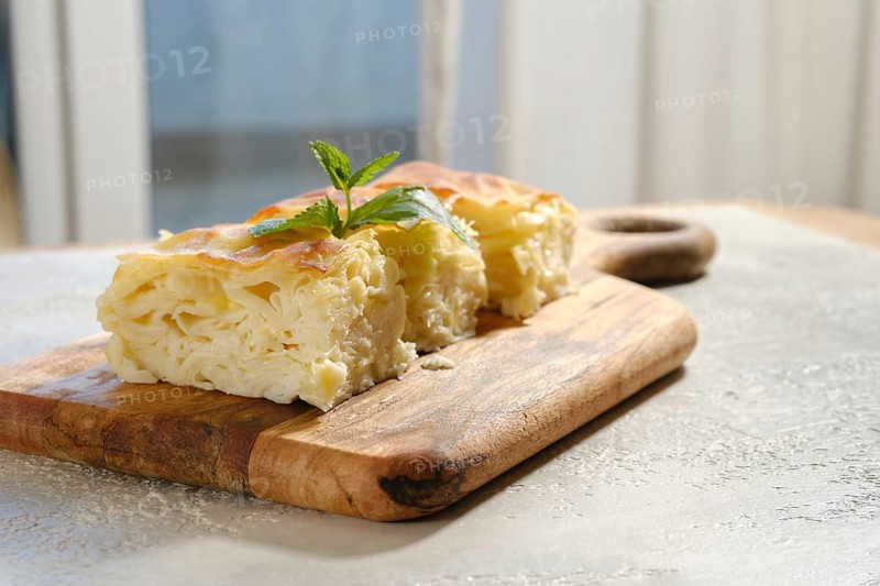 Traditional Georgian homemade cheese pie Achma served on a table