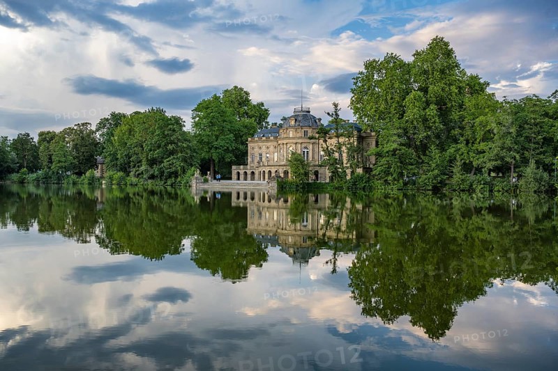 Seeschloss Monrepos is reflected in Lake Eglosheim, Ludwigsburg, Baden-Württemberg, Germany, Europe