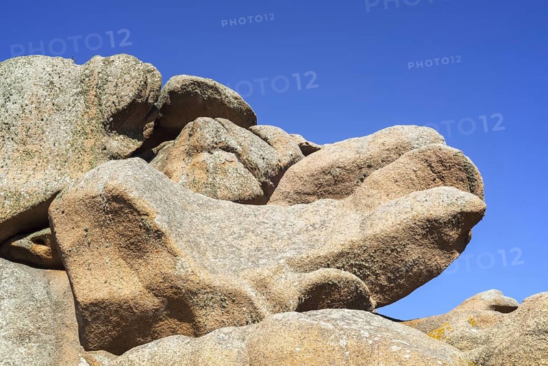 Strange rock formations and water, wind eroded boulders along the Côte de granit rose, Pink Granite Coast, Côtes d'Armor, Brittany, France, Europe