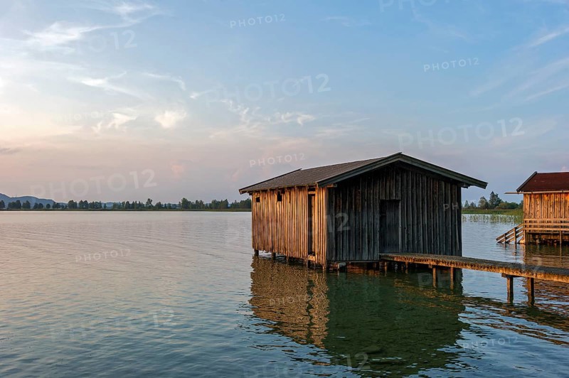 Boat huts with wooden jetty, sunset at Lake Kochel near Kochel am See, Bavarian Alpine foothills, Alps, Upper Bavaria, Bavaria, Germany, Europe