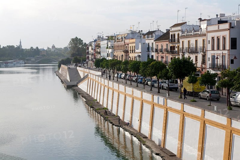 Historic houses on Calle Betis in the Triana district on the banks of the Guadalquivir river, Seville, Spain, Europe
