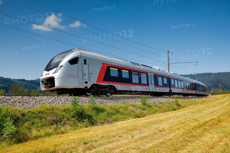 Train travelling along the Rothenthurm high moor, Canton Schwyz, Switzerland, Europe