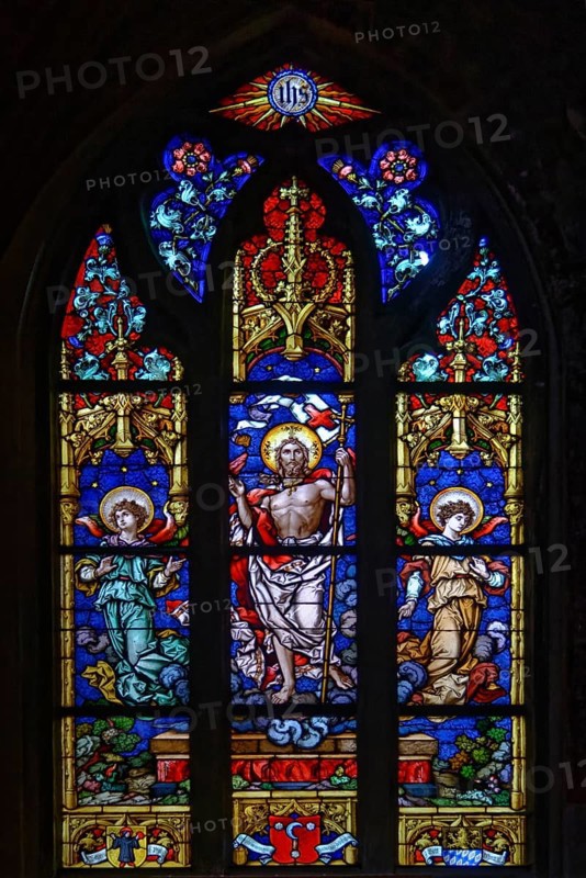 A colourful stained glass window with Christian motifs in the Basilica of St. Martin, Amberg, Upper Palatinate, Bavaria, Germany, Europe