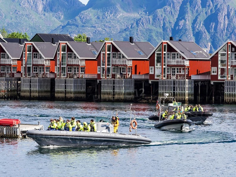 Rib boats with tourists return to Svolvær harbor, Svolvær, Lofoten, Norway, Europe