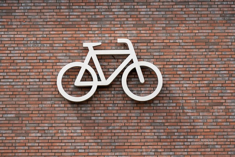 Bicycle symbol on a wall, pictogram, bicycle car park, Dülmen, Münsterland, North Rhine-Westphalia, Germany, Europe