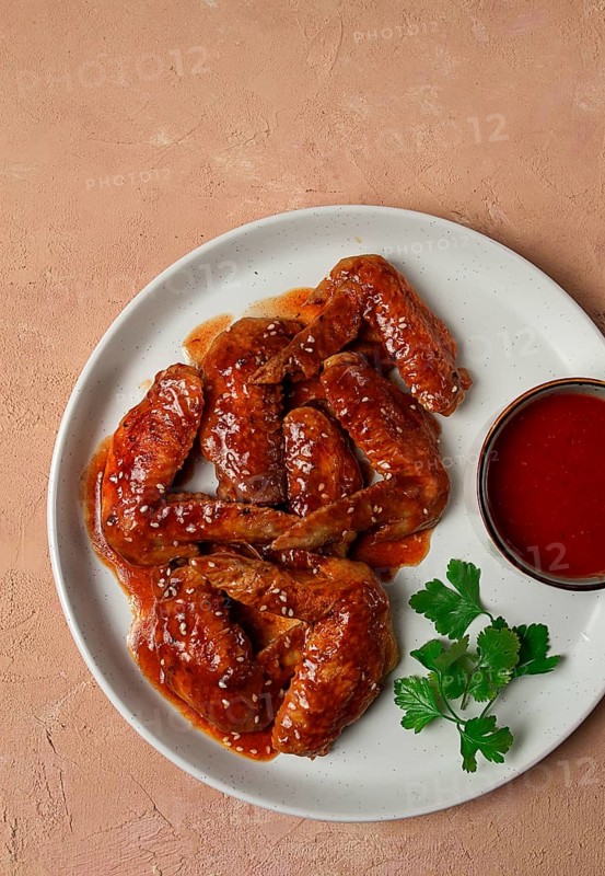 Chicken wings, with barbecue sauce, with tomato sauce, fast food, no people