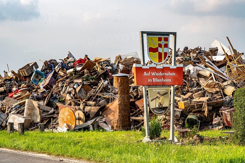 Flood at the Erft, at the end of the district Bliesheim, Erftstadt, the household rubbish was stored, which was taken out of the flats and houses of the village, after the flooding of the village, North Rhine-Westphalia, Germany, Europe