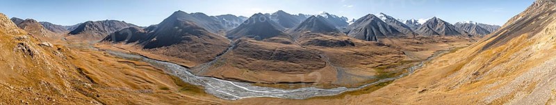 Aerial view, Burkhan mountain valley with meandering river, barren dramatic mountain landscape, Terskey Ala-Too, Tien Shan, Issyk Kul province, Kyrgyzstan, Asia