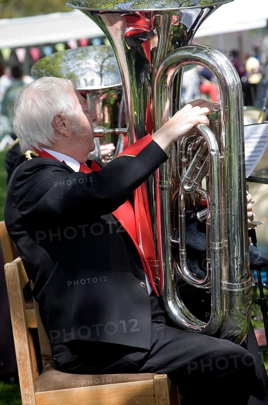 Musicians in a brass band perform during a country fair at Helmingham Hall, Suffolk, England, United Kingdom, Europe