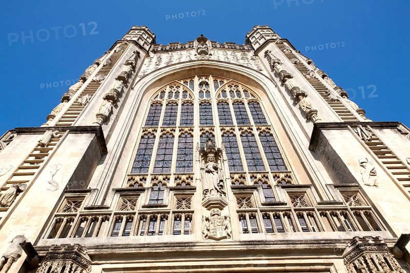 Angels and ascending and descending on ladders frontage, Abbey church, Bath, Somerset, England, United Kingdom, Europe