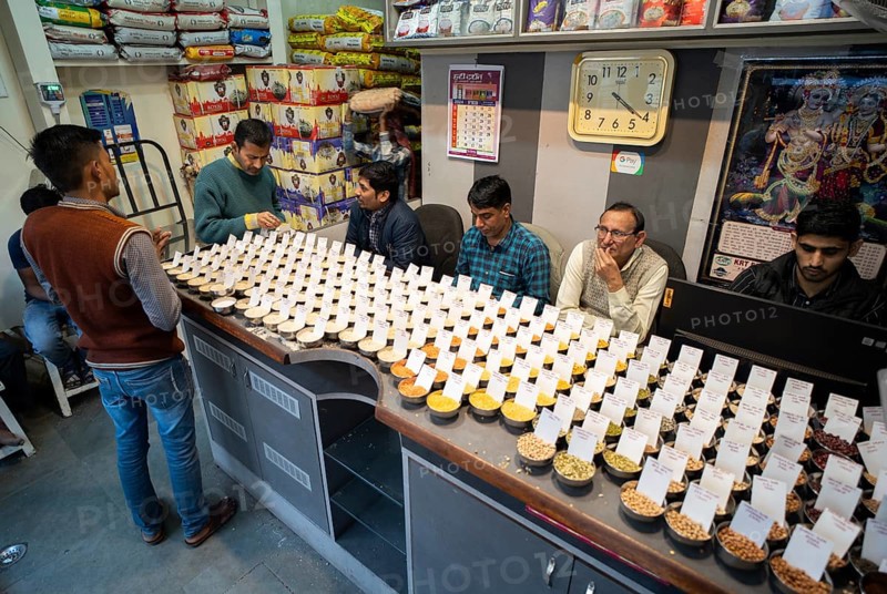 Samples of pulses kept on display inside a shop at a wholesale market ahead of the presentation of the Interim Budget 2024 by Union Finance Minister Nirmala Sitharaman, in Guwahati, Assam, India on Thursday, Feb. 1, 2024