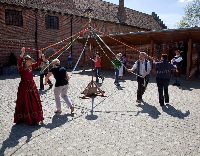 People maypole dancing during Tudor history re-enactment day, Layer Marney Tower, Essex, England, United Kingdom, Europe