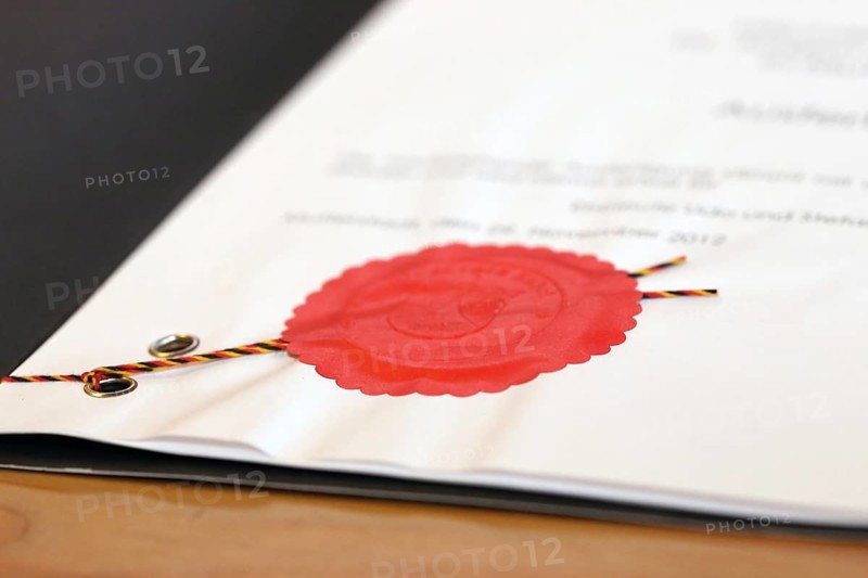 Notarised contract with red official seal