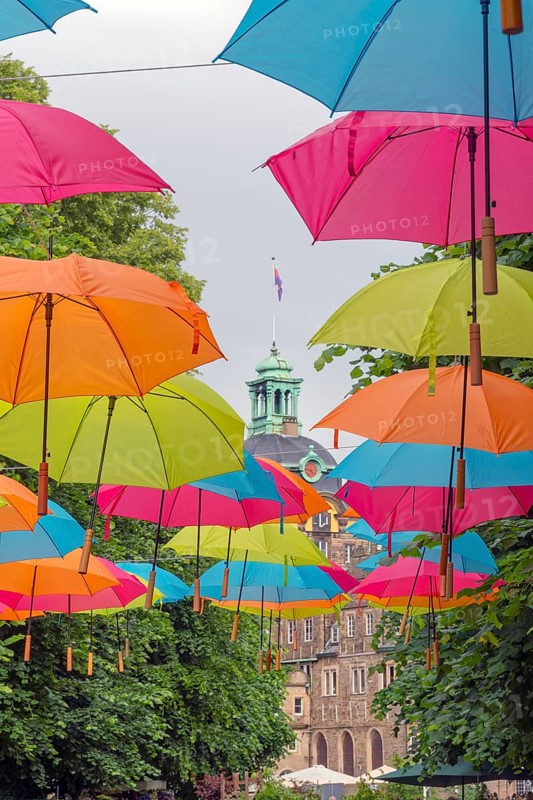 Flying umbrellas in front of Bückeburg Castle Landpartie Bückeburg Germany