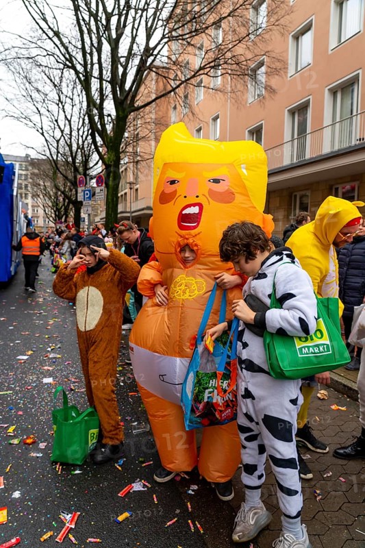 Rose Monday parade in Düsseldorf, street carnival, US President Donald Trump in a nappy, as a costume
