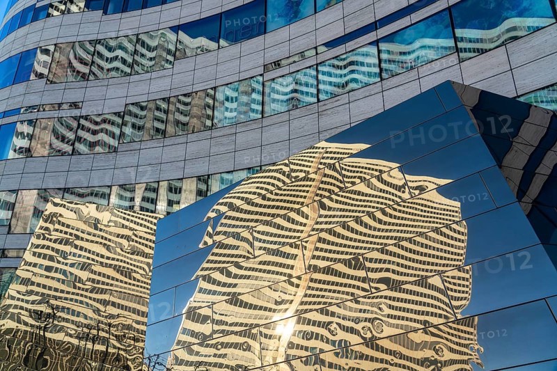 Reflection of the Dreischeibenhaus in the façade of the Kö-Bogen building, shops, restaurants and offices, am Hofgarten, Düsseldorf, Germany, Europe