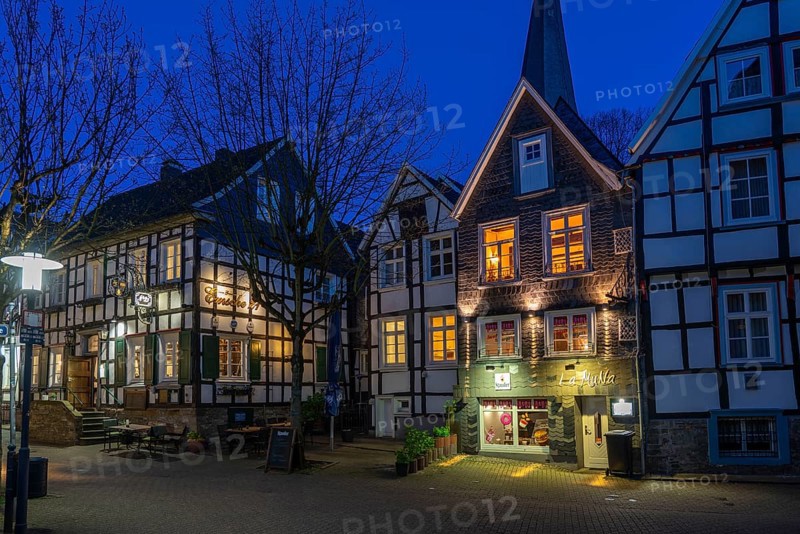 The old town of Hattingen, Emschestraße, St. George's Church, leaning church tower, half-timbered houses, North Rhine-Westphalia, Germany, Europe