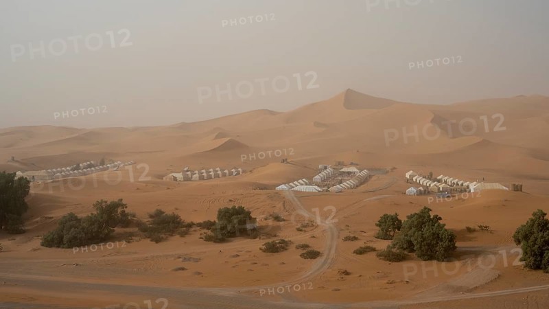 Sandstorm in the desert, desert camps and tents, dunes, Erg Chebbi, Sahara, Merzouga, Morocco, Africa