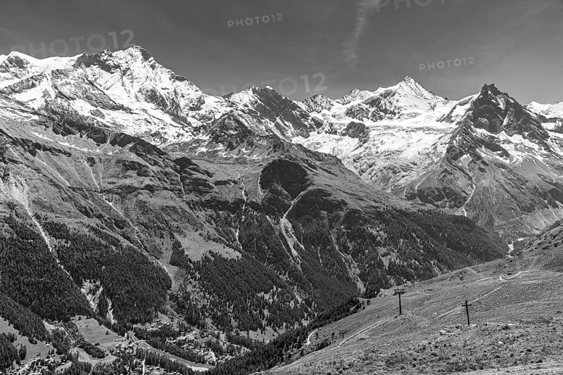 Alpine meadows at the summit of Corne de Sorebois, behind the snow-covered peaks of Weisshorn, Bishorn, Zinalrothorn and Obergabelhorn, black and white photo, Val d'Anniviers, Valais Alps, Canton Valais, Switzerland, Europe