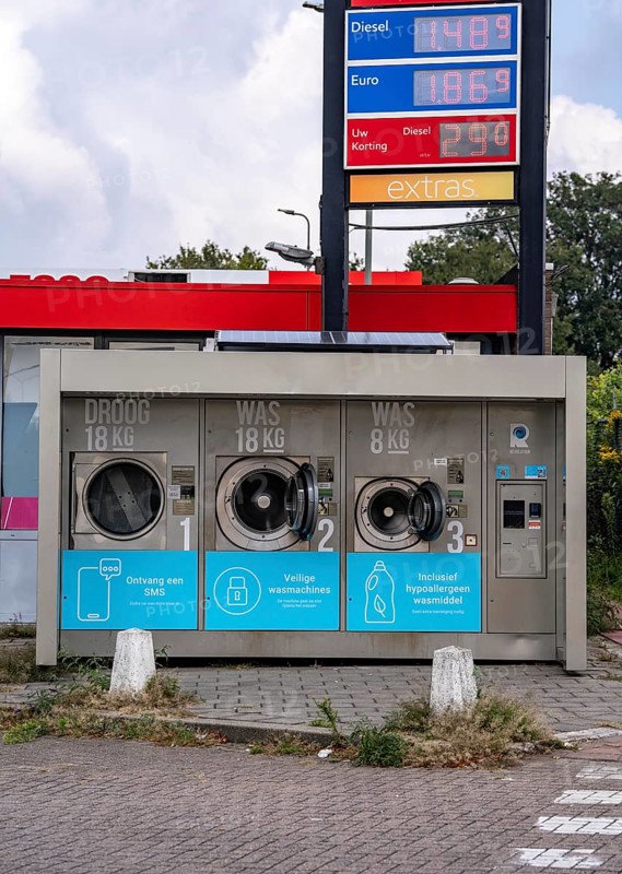 Self-service washing machines, for laundry, clothing, open 24 hours, around the clock, at a petrol station, on the border of Germany and the Netherlands in Venlo