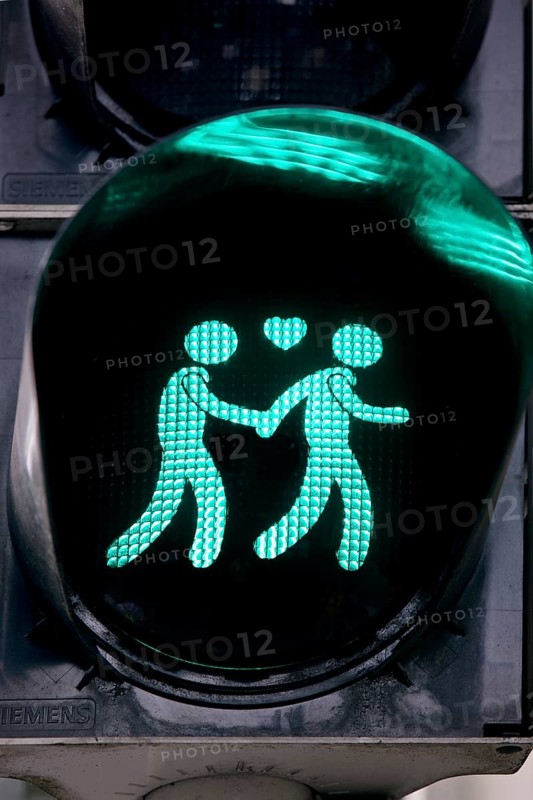 Green pedestrian traffic light with two men and heart, male traffic light couple, homosexual love, Münster, Germany, Europe