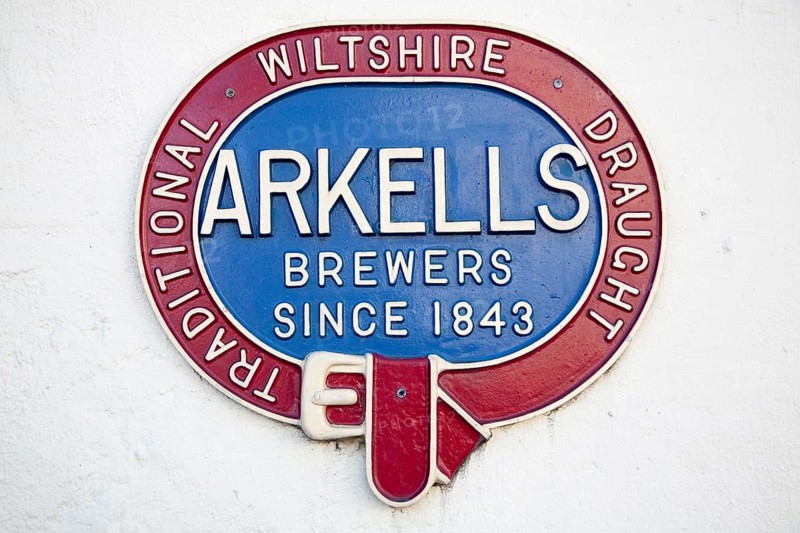 Close up of old metal advertising sign for Arkells brewers of traditional draught beer since 1843, Wiltshire, England, United Kingdom, Europe