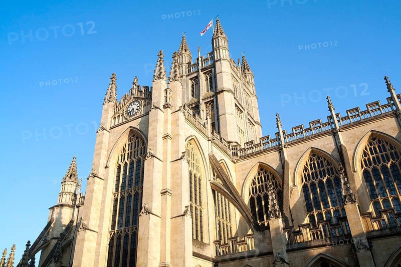 English flag flying on the tower of the Abbey church, Bath, Somerset, England, United Kingdom, Europe