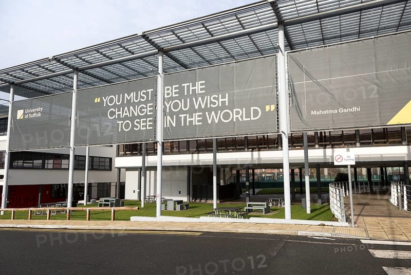 University of Suffolk buildings, Ipswich, England, UK with Mahatma Gandhi quotation about change in the world