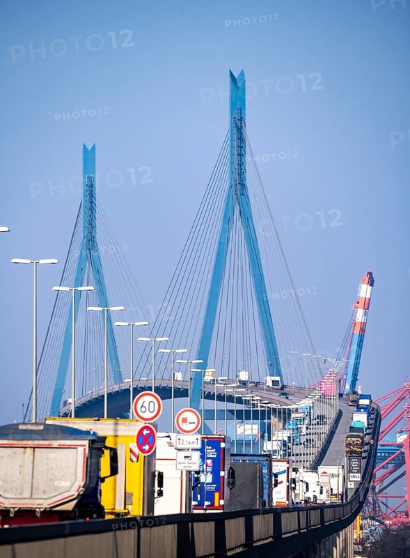 Traffic on the Köhlbrand Bridge in the port of Hamburg, spans the 325 m wide Köhlbrand, an arm of the Süderelbe, the bridge is over 3600 metres long, 53 metres above the water, piers 135 m high, more than 30, 000 vehicles use the B3 bridge daily, important connection to the port, it is dilapidated, to be rebuilt, Hamburg, Germany, Europe