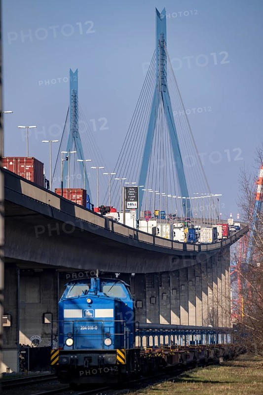 The Köhlbrand Bridge in the port of Hamburg, at the back of the goods train line, spans the 325 m wide Köhlbrand, an arm of the Süderelbe, the bridge is over 3600 metres long, 53 metres above the water, piers 135 m high, more than 30, 000 vehicles use the B3 bridge daily, important connection to the port, it is dilapidated, to be rebuilt, Hamburg, Germany, Europe