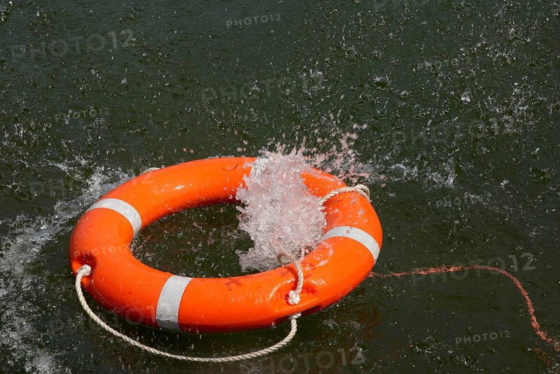 Lifebuoy with lifeline in the water, distress at sea, drowning, accident, danger, shipping, seafaring, rescue, splashing water, Hamburg, Hamburg, Federal Republic of Germany