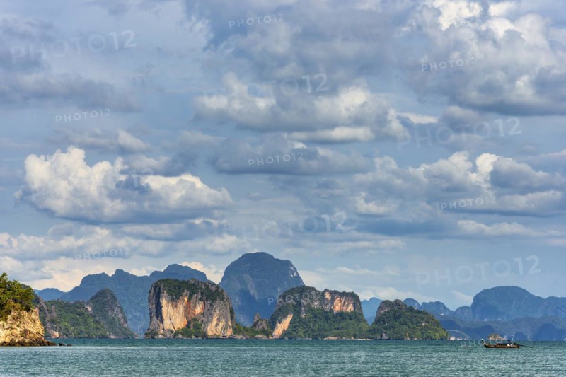 Phang Nga bay near Koh Yai Noi, seascape, seascape, nature, natural landscape, mountains, mountainous, chalk cliffs, rocks, rocky, cliffs, lagoon, cloud, cloudy sky, sky, panorama, limestone, sandstone, holiday, travel, tourism, beach holiday, beach holiday, sun, sunny, climate, water, sea, ocean, coast, coastal landscape, paradise, holiday paradise, paradisiacal, boat, island, dream holiday, symbolic, Asian, exotic, beautiful, Phangnga, Phuket, Thailand, Asia