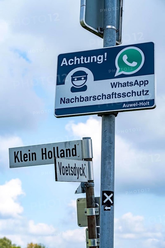 Neighbourhood protection sign against burglars, via WhatsApp groups, rural area near the village of Auwel near Straelen, North Rhine-Westphalia, Germany, Europe