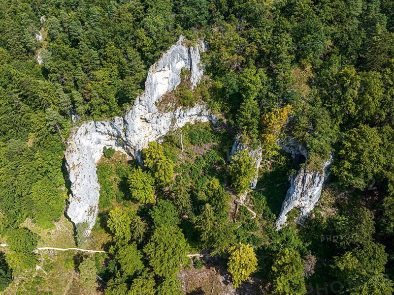 UNESCO World Heritage Caves and Ice Age Art of the Swabian Alb. Ice Age cave Geißenklösterle in the Achtal valley, site of important archaeological excavations from the Aurignacian period, drone photo. Blaubeuren, Baden-Württemberg, Germany, Europe