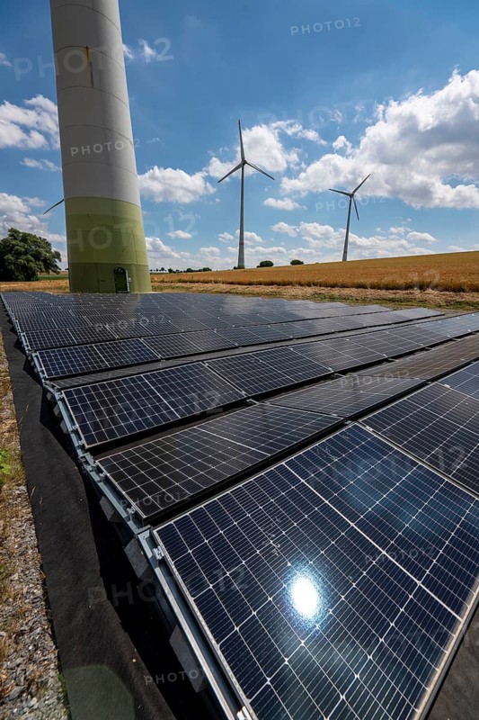 Wind farm near Lichtenau, Ostwestfalen-Lippe, a 100 kW solar power system was installed on the crane installation area in front of a wind turbine, as a trial, so the unused former construction site areas could be used for PV systems, North Rhine-Westphalia, Germany, Europe