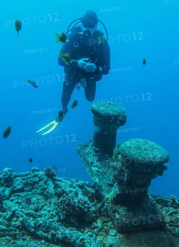 Diver on the upper deck, dive site wreck of the Thistlegorm, Red Sea, Egypt, Africa