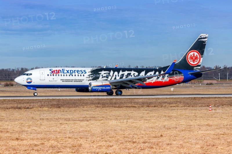 A Boeing 737-800 aircraft of SunExpress with the registration TC-SPC and the Eintracht Frankfurt special livery at the airport in Stuttgart, Germany, Europe
