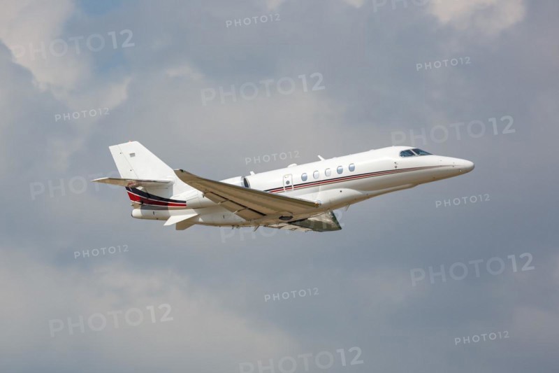 A Cessna Citation Latitude private jet aircraft of Netjets with the registration number N525QS at Dallas Airport, USA, North America