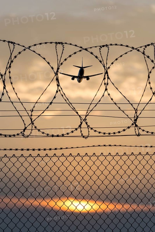Symbolic image security, passenger aircraft taking off, security fence, Stuttgart Airport, Baden-Württemberg, Germany, Europe