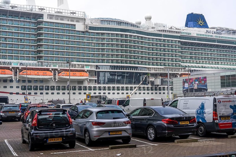Cruise ship Iona of the British shipping company P&O Cruises, the largest cruise ship ever built in Germany, 17 passenger decks, 2600 cabins for 5200 passengers, the ship is powered by liquid gas, lifeboats, moored at the pier of Cruise Terminal Rotterdam, car park