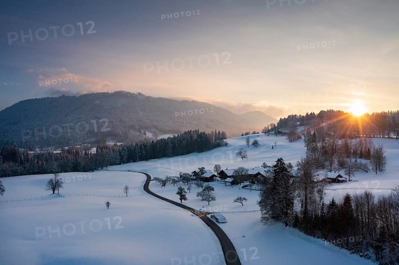 Sunset, Kiefersau am Buchberg in winter, behind Blomberg, drone shot, Tölzer Land, Upper Bavaria, Bavaria, Germany, Europe