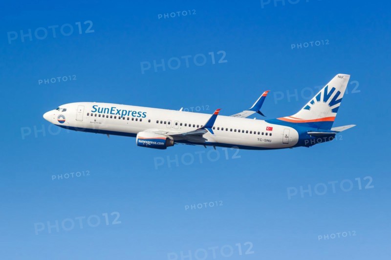A Boeing 737-800 aircraft of SunExpress with the registration TC-SNU at the airport in Munich, Germany, Europe
